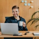 cheerful-caucasian-man-working-with-laptop-and-wir-2023-11-27-04-46-23-utc-1-1.jpg